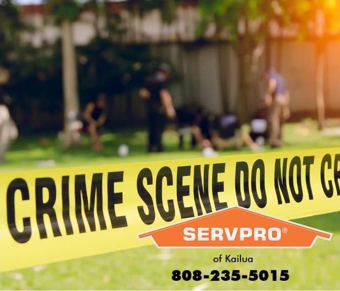 Yellow crime scene tape announces an active crime scene investigation.